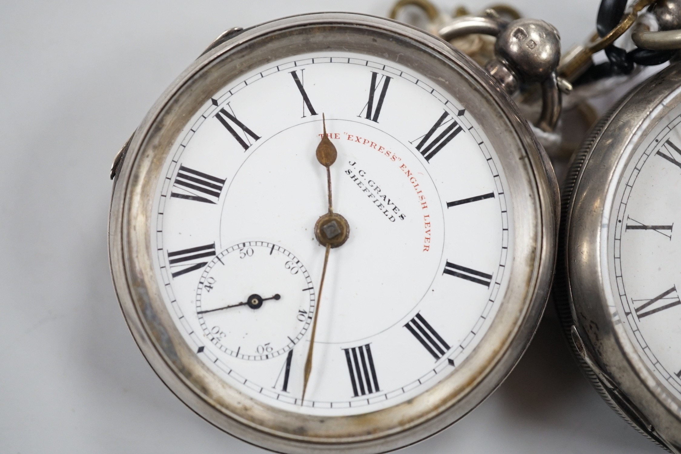 Two silver open face keywind pocket watches, Waltham and Graves of Sheffield.